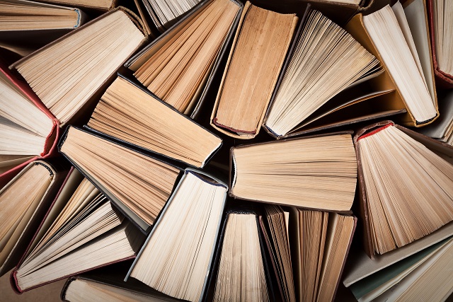 Top view of a group of books standing upright