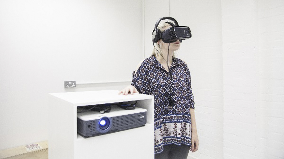Student, Frances Glazier, uses a virtual reality headset