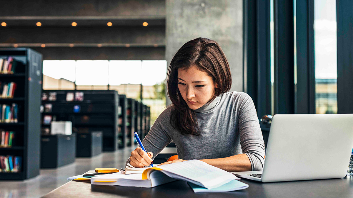 Student working in a library