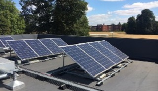 Solar panels on the roof of a building on the Whiteknights Campus
