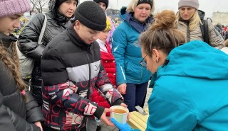 Artists for Ukraine volunteers hand out soup in Lviv Ukraine, in March 2022