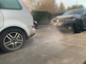 Fumes coming out of a car exhaust