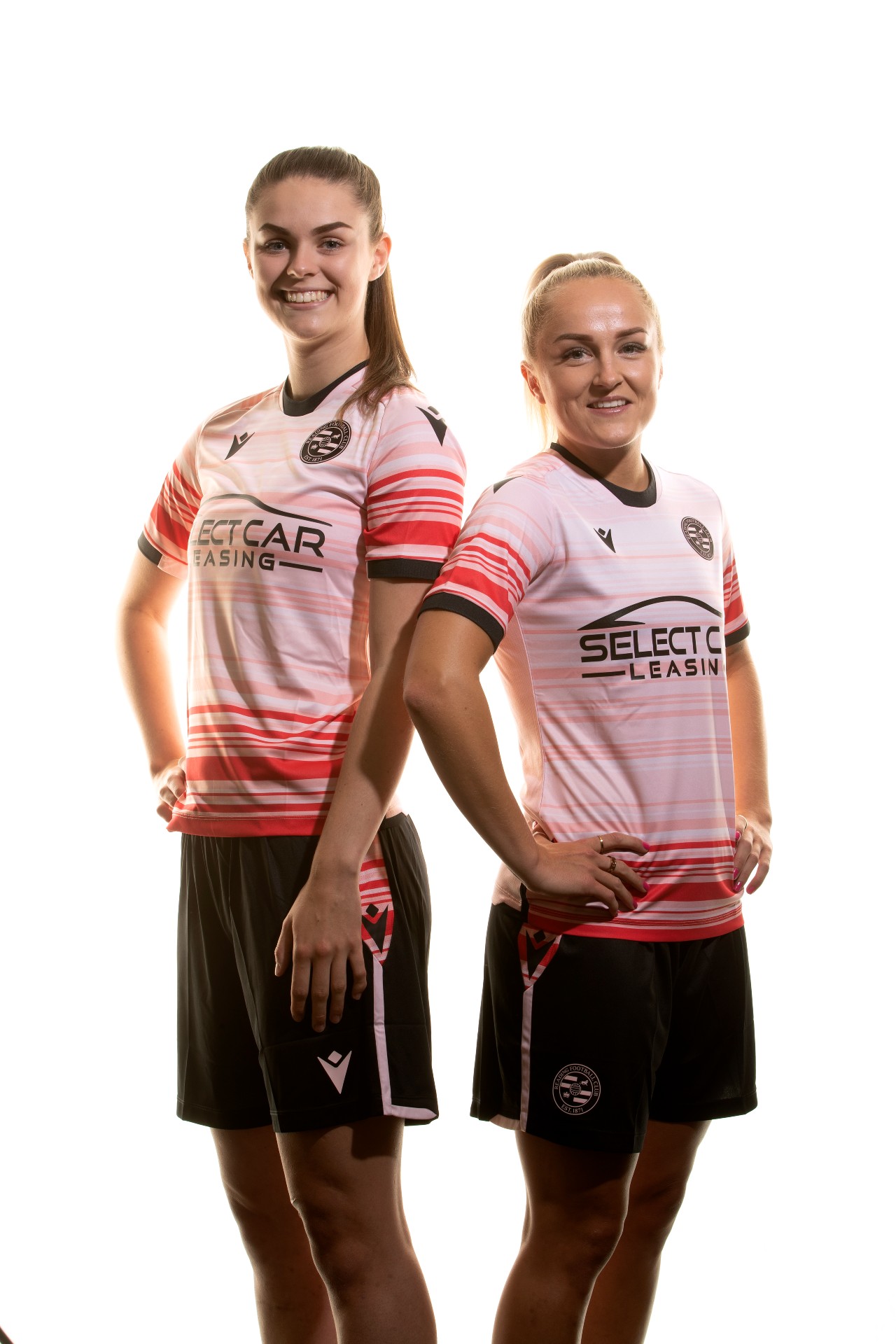 Emma Harries and Faye Bryson of Reading FC's women's team wearing the new away kit