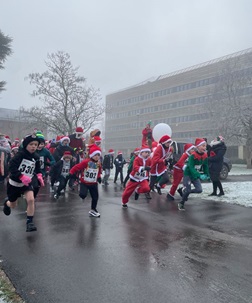 CREDIT: George, Year 13 - Reading School Children taking part in the Mini Santa and Elf Run