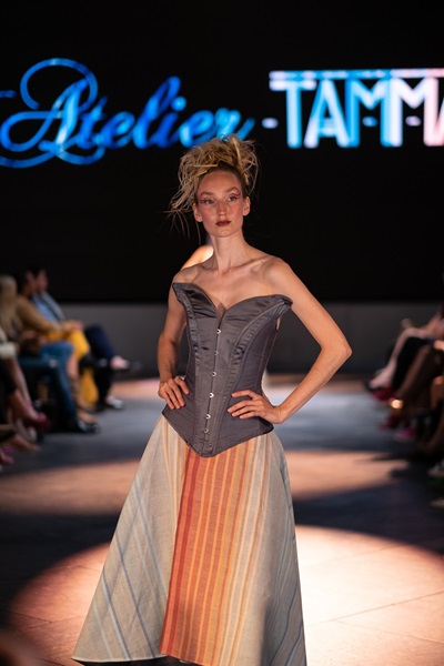 Warming stripes-inspired clothing being modelled at the London Fashion Week launch of the Tammam x University of Reading eco-friendly range