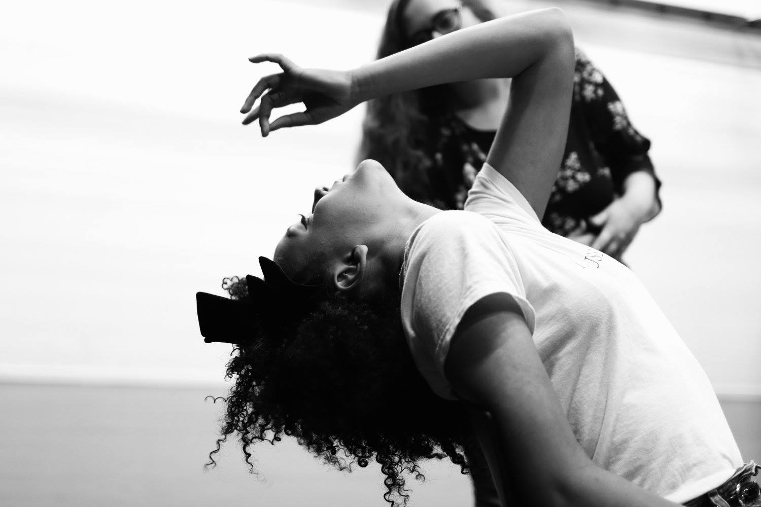 Drama society girl posing artistically in black and white