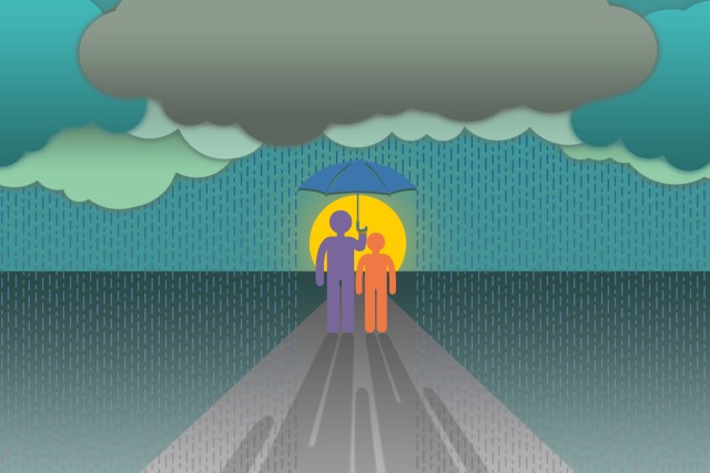 An image of 2 people under an umbrella during a storm